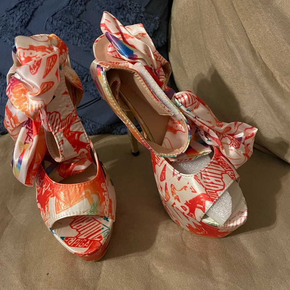 Brand new Multi color heels from Akira
